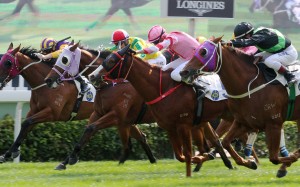 Storm Signal (left) gets overrun by Key Witness (right) at Sha Tin on Sunday. Photos: Kenneth Chan