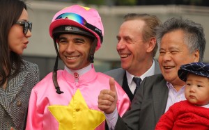Joao Moreira and John Size share in the celebrations with the connections of Unicron Jewellery. Photos: Kenneth Chan