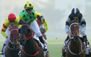 Joao Moreira celebrates winning the Hong Kong Classic Mile with Nothingilikemore. Photos: Kenneth Chan