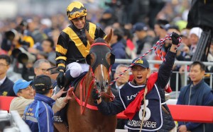 Glorious Forever and Silvestre de Sousa are led back by a happy mafoo after their Longines Hong Kong Cup victory. Photos: Kenneth Chan