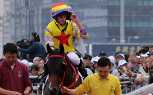 Ryan Moore returns to scale after winning last year’s Hong Kong Derby on Ping Hai Star for trainer John Size. Photos: Kenneth Chan