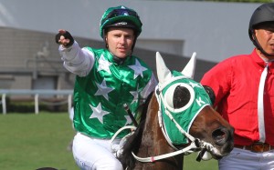 Tommy Berry returns to the winner’s circle after winning the Group One Champions & Chater Cup (2,400m) on Pakistan Star. Photos: Kenneth Chan