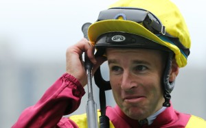 Jockey Tommy Berry shares a laugh after winning on Green Card at Sha Tin on Sunday. Photos: Kenneth Chan