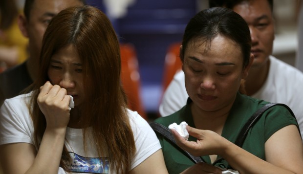 As Chinese families mourn the dead in Thai tour boat disaster, calls