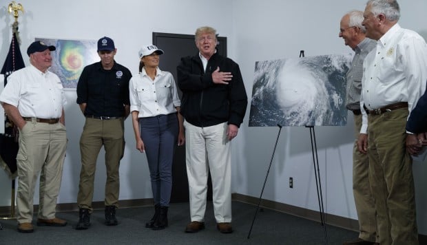 Climate change? It goes back and forth, says Trump on storm damage tour