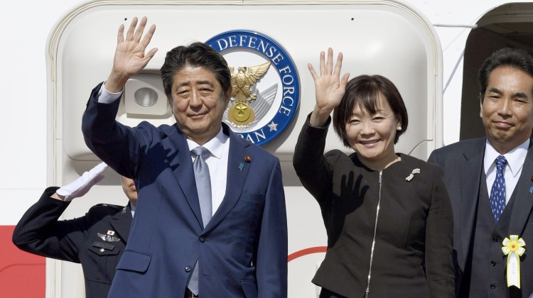 Japanese Prime Minister Shinzo Abe and his wife Akie at Haneda airport in Tokyo before leaving for China today. Picture: Kyodo