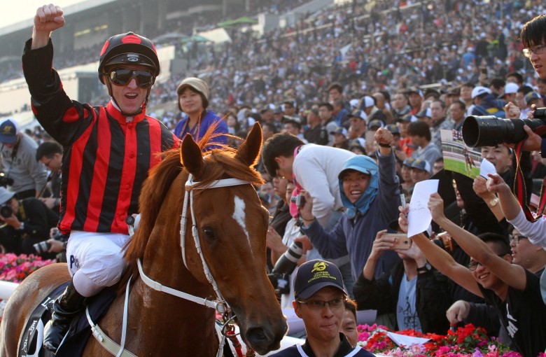 Zac Purton celebrates Time Warp’s win in the Group One Hong Kong Cup. Photos: Kenneth Chan