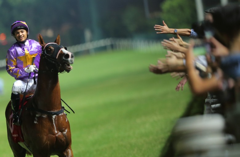 Grant van Niekerk returns to scale after winning with Little Bird on Wednesday night. Photos: Kenneth Chan