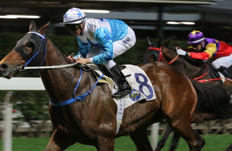 Smart Baby salutes under Zac Purton at Happy Valley on Wednesday night. Photos: Kenneth Chan