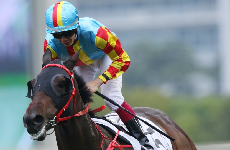 Derek Leung wins the Hong Kong Classic Cup (1,800m) on long-shot Mission Tycoon at Sha Tin on Sunday. Photos: Kenneth Chan