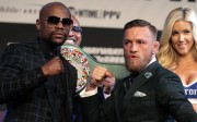 Boxer Floyd Mayweather Jnr and MMA fighter Conor McGregor pose at the MGM Grand in Las Vegas ahead of their 12-round contest under boxing rules this weekend, tipped to become the richest fight in history. Photo: AFP
