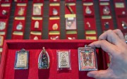 Thai amulets in Amulet Studio, a shop in Fu Lu Shou, a shopping mall specialising in religious and mystic merchandise in central Singapore.