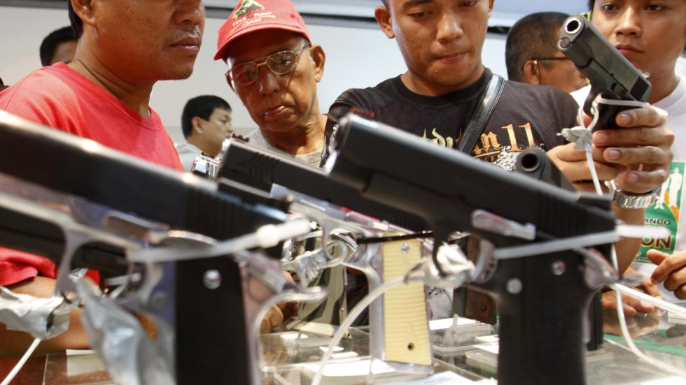 New Philippine law allows priests, journalists, lawyers to carry guns