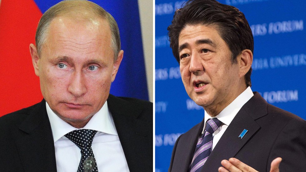 Japan's Shinzo Abe puts off visit by Vladimir Putin after Ukraine