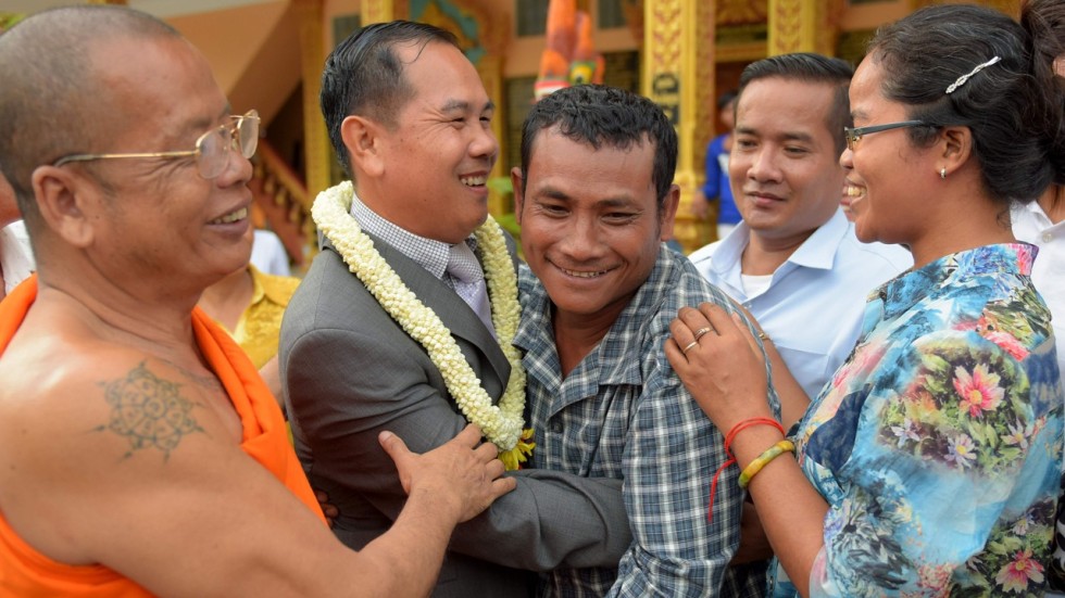 Image result for King pardons ex-Cambodian opposition lawmaker jailed over Facebook post about Vietnam border