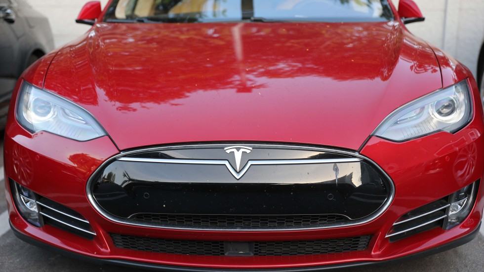 Image result for Tesla urges tariff exemption for Chinese-made car computer 'brain'