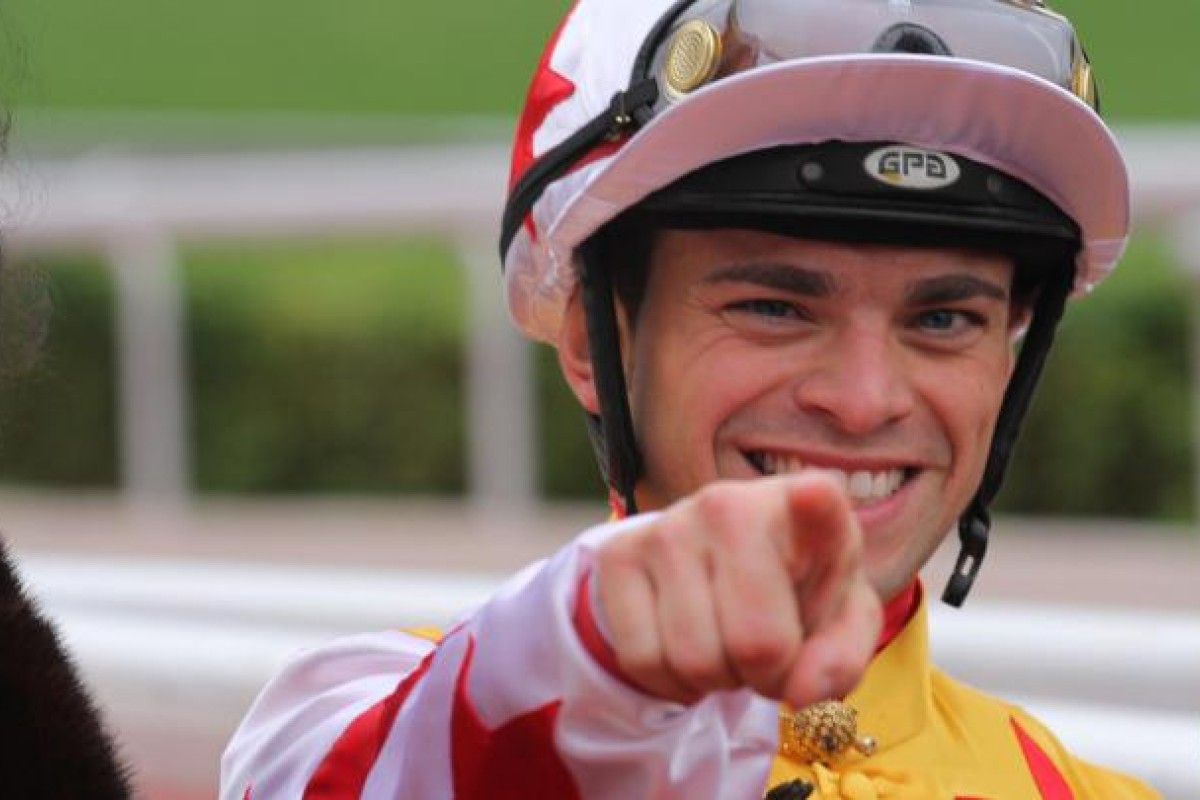 Umberto Rispoli points his way towards the stands. Photo: Kenneth Chan