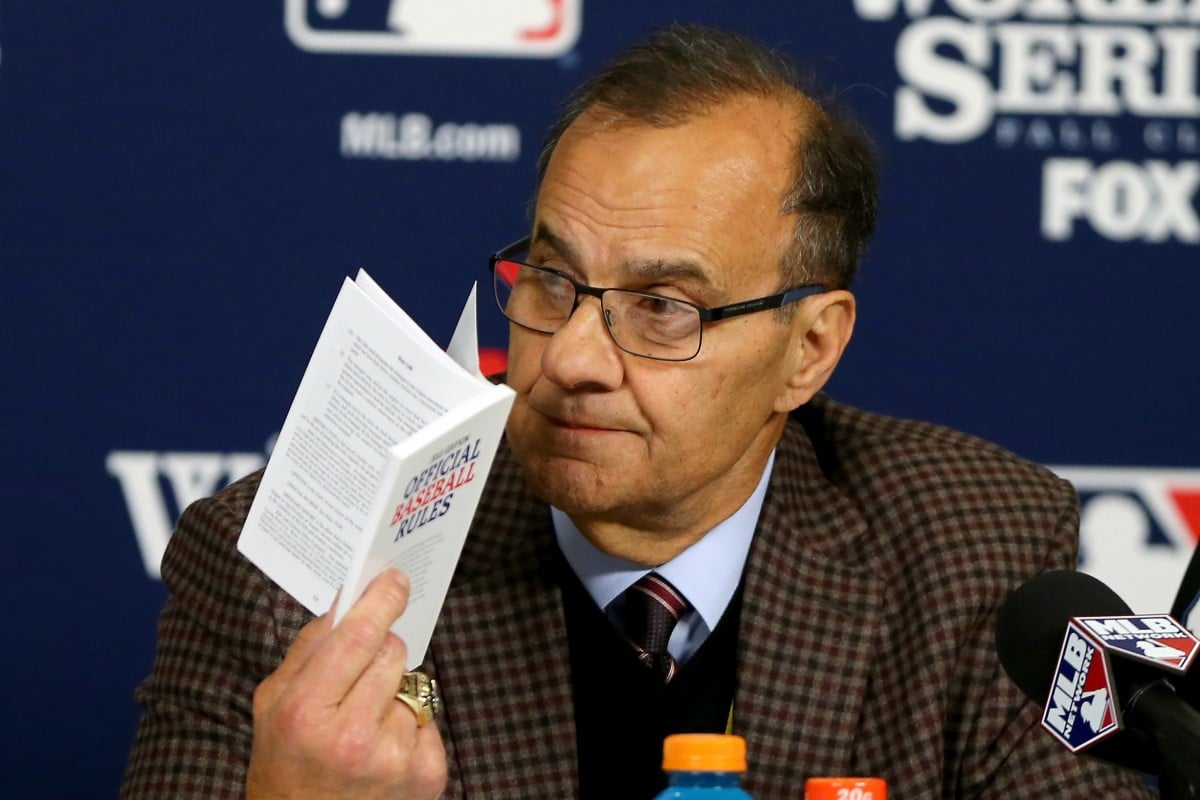 Joe Torre has one eye on the World Series and the other on his horse Game On Dude. Photo: AFP