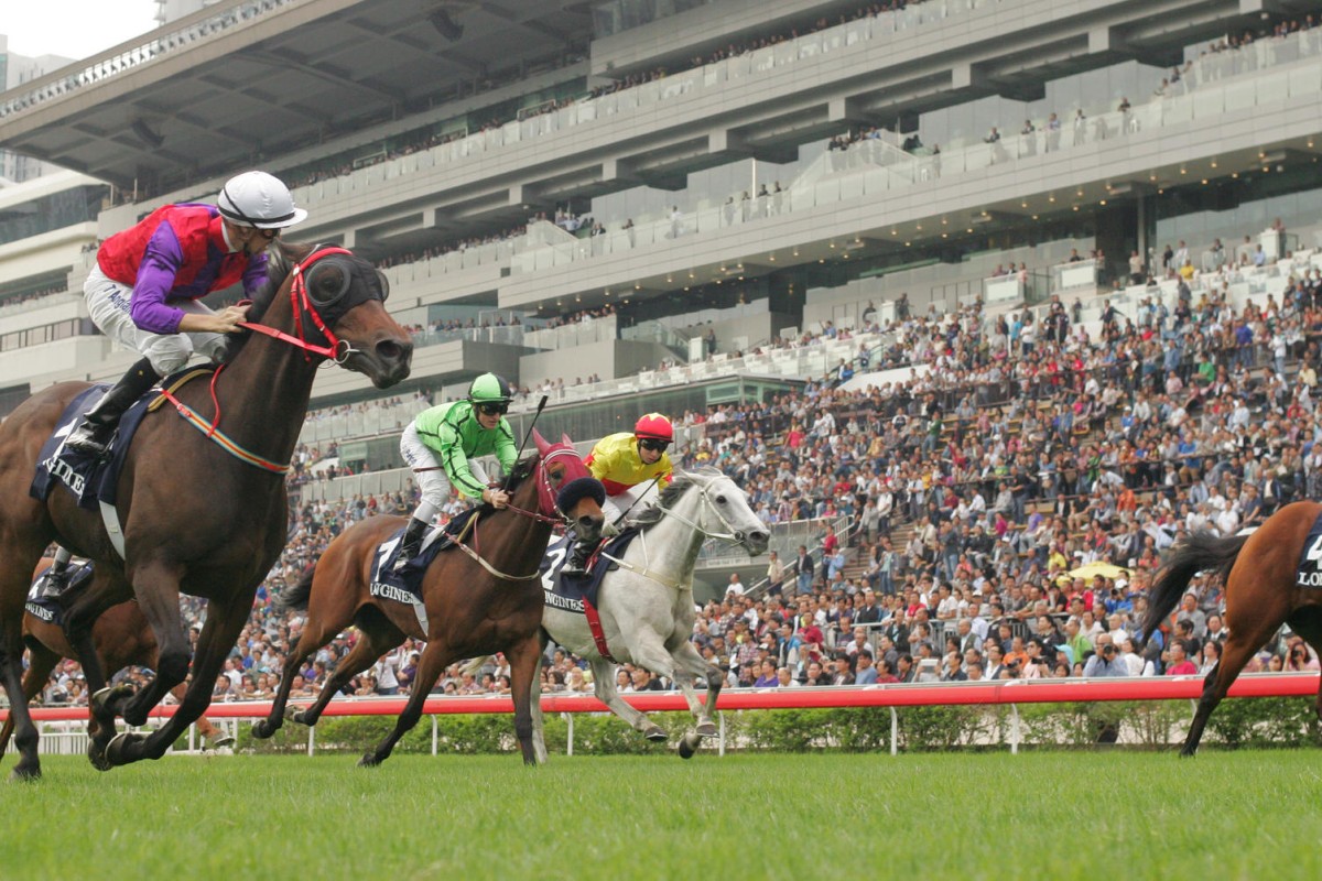 Endowing (Tye Angland, left) crosses the line to win the Longines Jockey Club Cup in front of Military Attack (Zac Purton, middle), who finishes third. Photos: Kenneth Chan