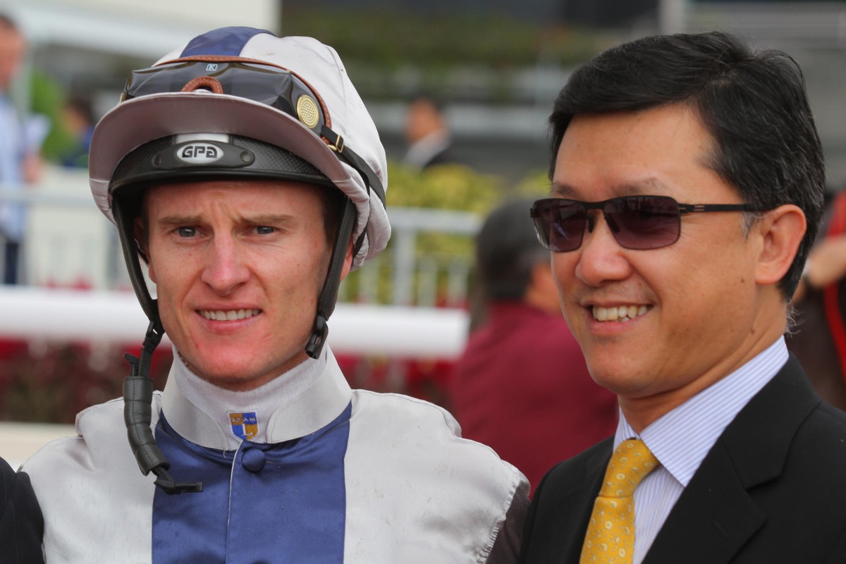 Jockey Zac Purton with trainer Peter Ho Leung after his dead-heat win on Sunday at Sha Tin. This means he has two dead-heats for the season and for the moment they count as two whole wins. Photo: Kenneth Chan
                           