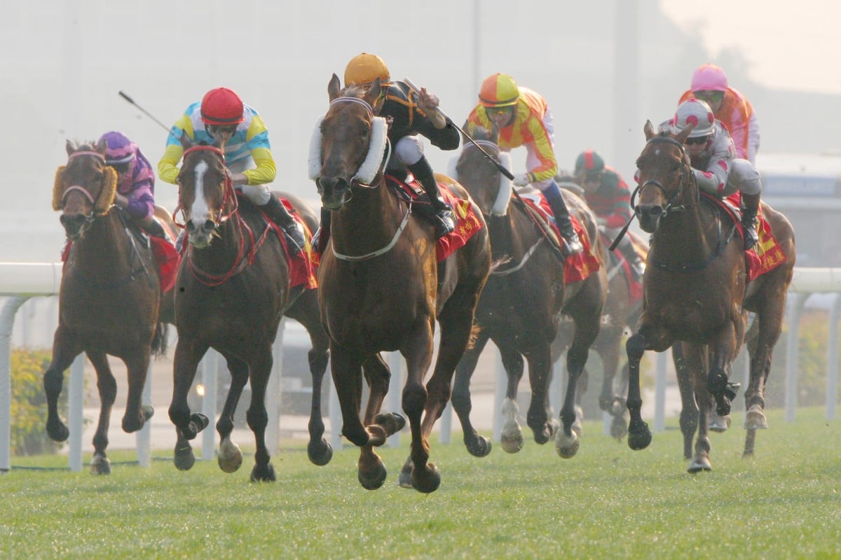 Able Friend, ridden by Joao Moreira, storms home to win the Classic Mile ahead of Designs on Rome (Tommy Berry) and Dibiyani (Zac Purton). Photo: Kenneth Chan