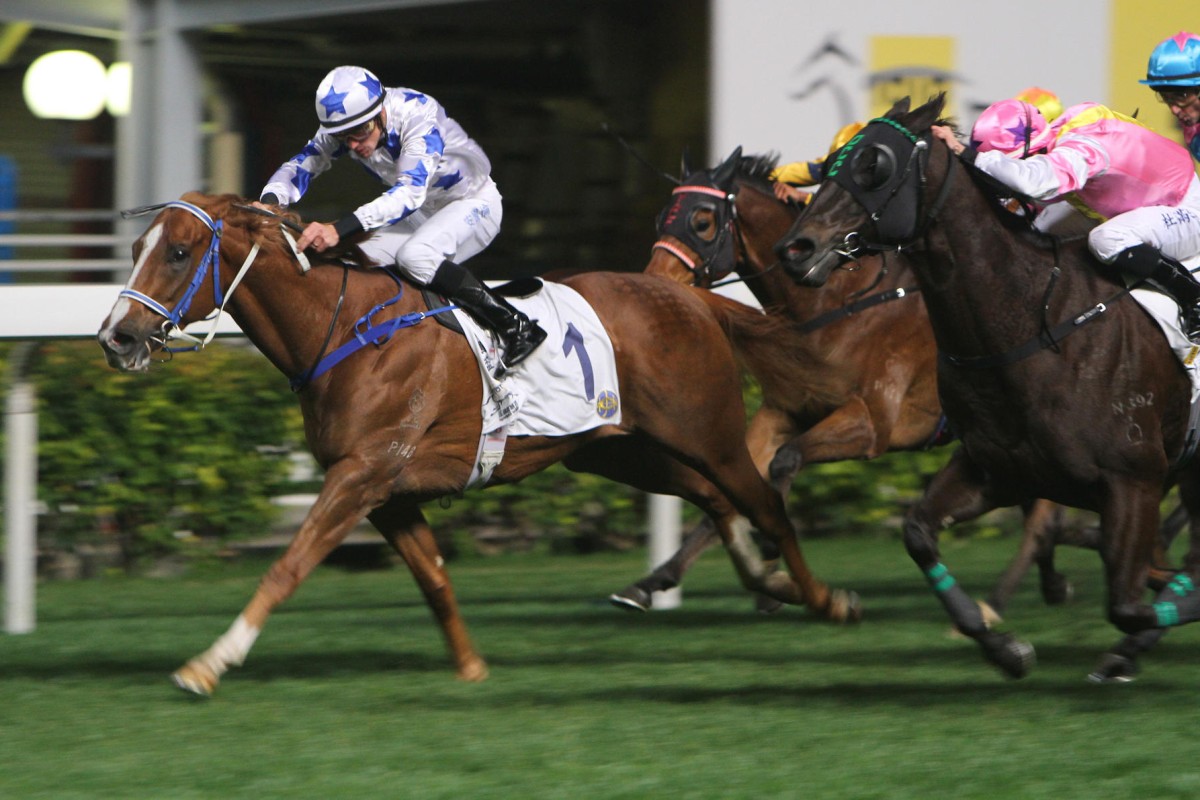 Tye Angland gets Braveness over the line to win the Volunteers' Challenge Cup at Happy Valley last night. Photo: Kenneth Chan