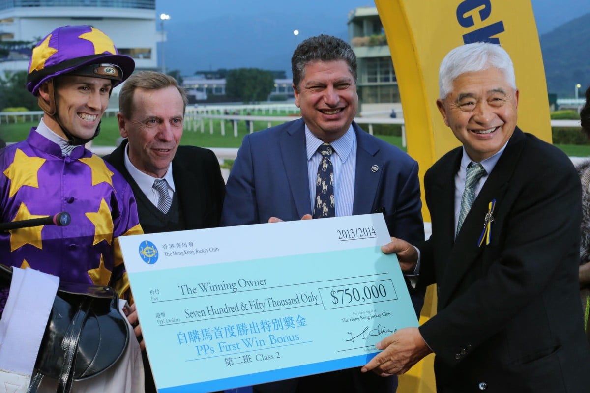 Jockey Tye Angland, trainer John Size and owner Larry Yung Chi-kin receive the first win bonus for Private Purchases from the Jockey Club's Executive Director of Racing Bill Nader after Mirage's success. Photo: Kenneth Chan 