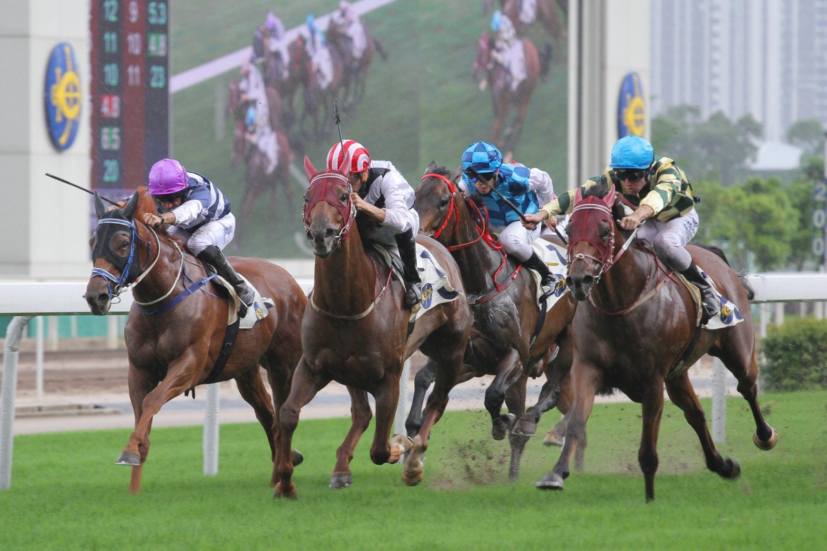 Tommy Berry (light blue cap) blitzes down the outside on Rewarding Hero to win the ATV Cup from Secret Sham and Packing Whiz at Sha Tin.