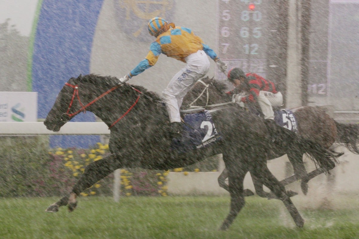 Mr Medici (Gerald Mosse) wins the Champions & Chater Cup in 2010, the last meeting which saw racing on a slow track. Photo: Kenneth Chan