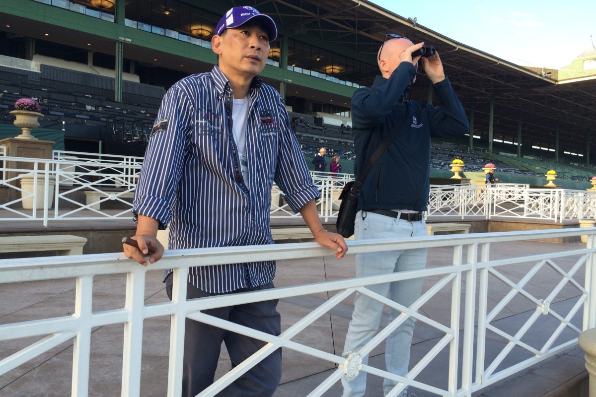 Michael Chang watches on as Rich Tapestry completes his final gallop. Photo: Michael Cox