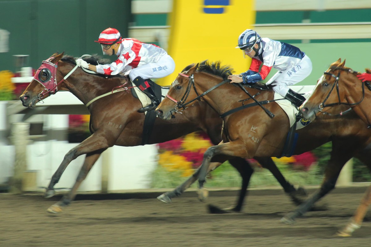 Joao Moreira punches out Verdane to win the last race for John Moore. They are set to combine again this weekend in the four international races. Photos: Kenneth Chan