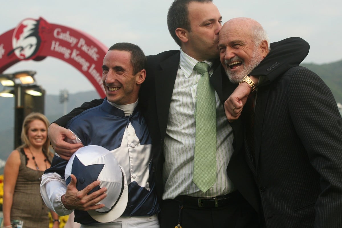 Caspar Fownes celebrates with his dad Lawrie and jockey Olivier Doleuze after winning the Hong Kong Mile at Sha Tin in 2006. 