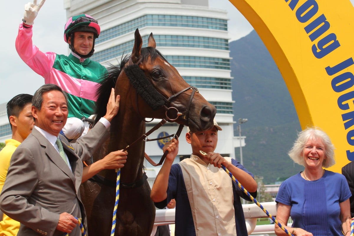 HKJC chairman Dr Simon Ip celebrates Glacier Blue's win on a day when past chairmen were in the spotlight. Photo: Kenneth Chan