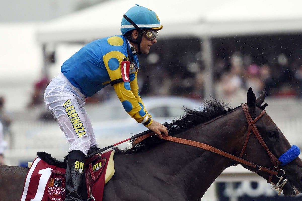 Victor Espinoza aboard American Pharoah after winning the 140th Preakness Stakes. Photo: USA Today Sports