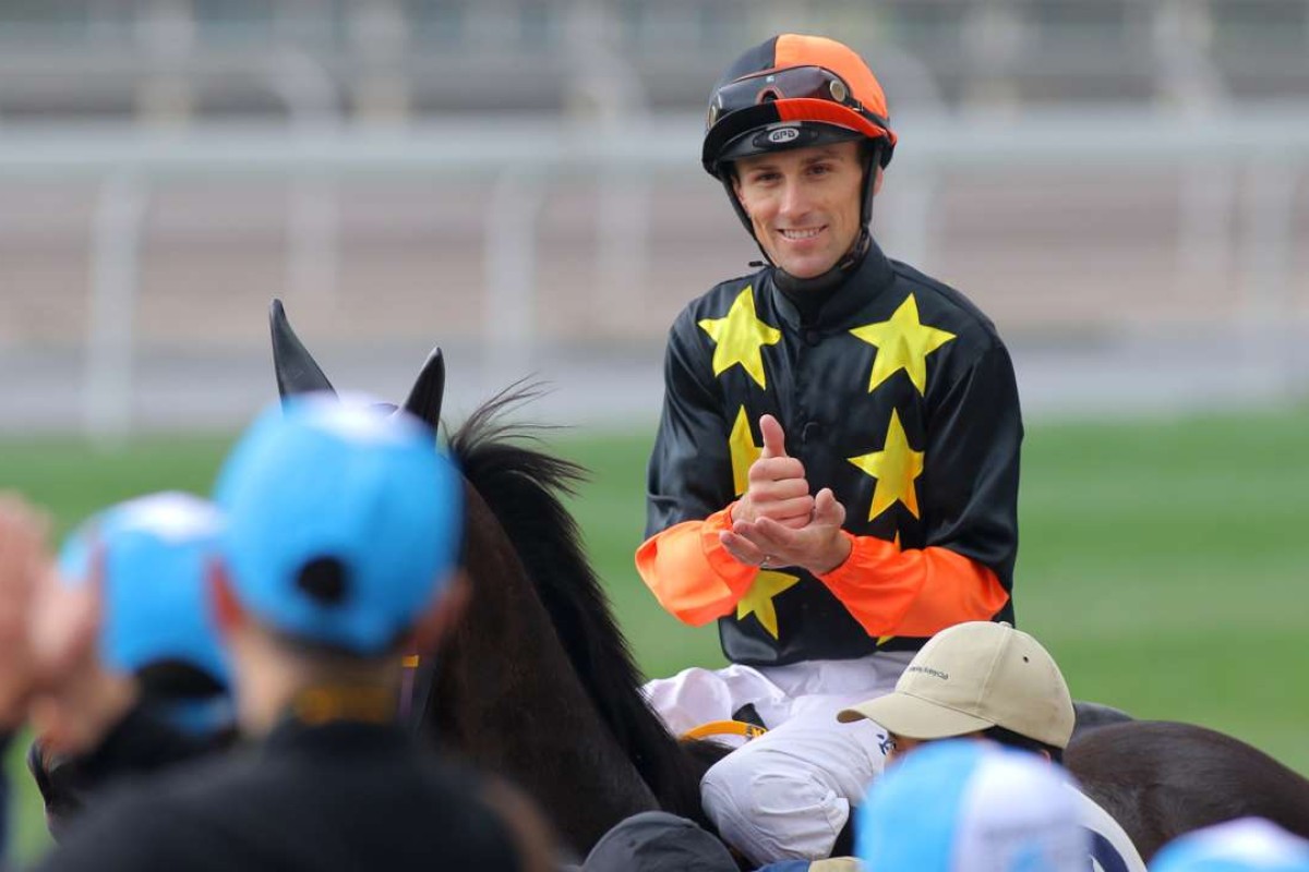 Tye Angland celebrates after winning on Happy Cooperation, the second leg of a double. Photo: Kenneth Chan