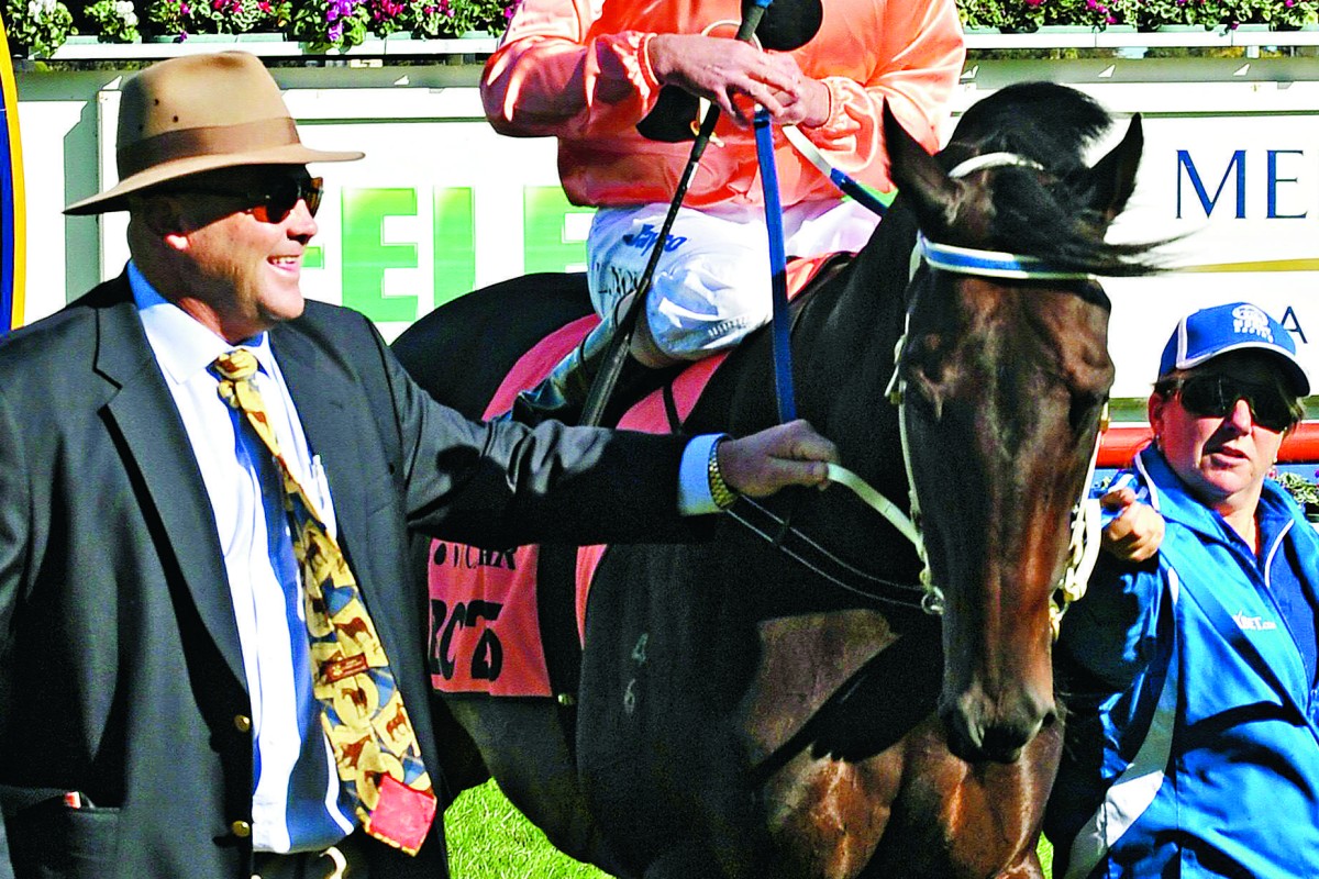 Trainer Peter Moody, pictured at the farewell to Black Caviar at Caufield in 2013, was found not guilty of giving any horse cobalt as a performance enhancer but his six month-ban came under the rule dealing with a trainer’s responsibility to present a horse drug-free for racing. Photo: AFP