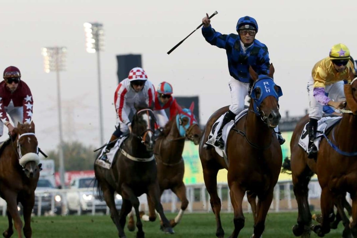 Damian Browne celebrates after leading Buffering to win the Al-Quoz Sprint during the Dubai World Cup meeting. Photo: AFP