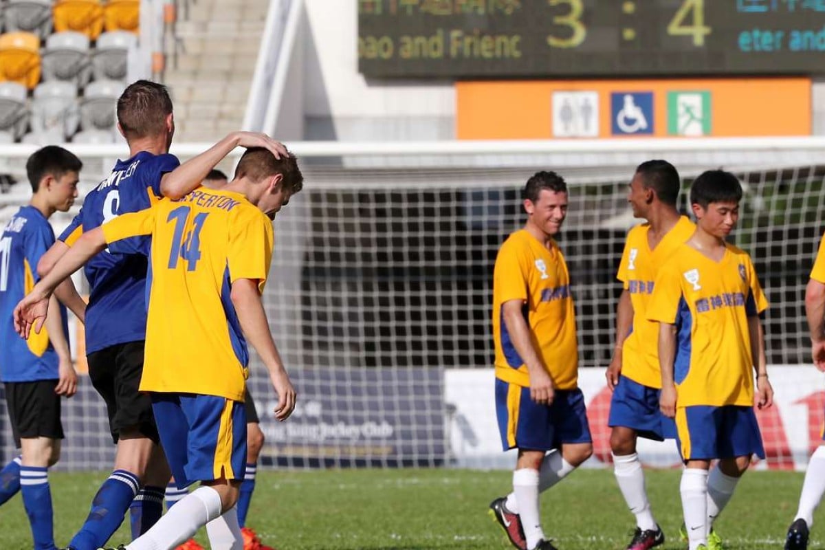 Players at the end of the Hong Kong Jockey Club Community Cup, which went to penalties at Mong Kok Stadium. Photos: Edward Wong