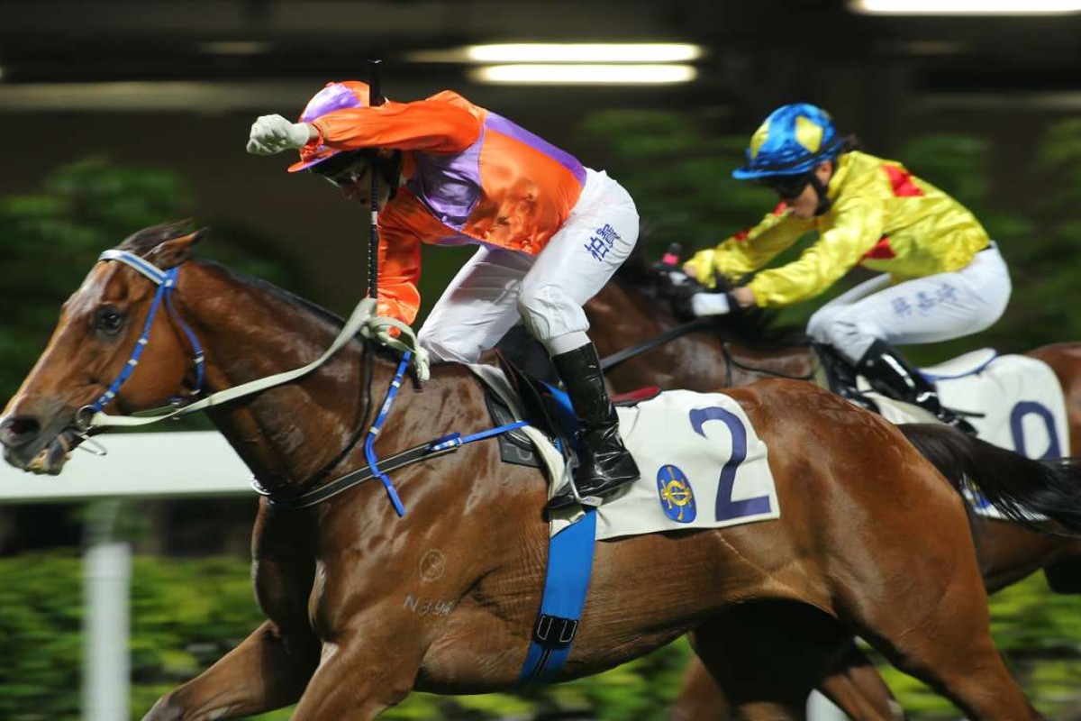 Brett Prebble salutes the crowd after prevailing on Royal Partner for trainer Caspar Fownes. Photos: Kenneth Chan