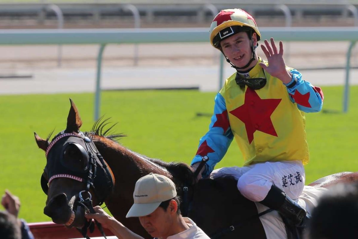 Oisin Murphy waves to the crowd after notching his first Hong Kong victory with Happy Agility at Sha Tin on Sunday. Photos: Kenneth Chan