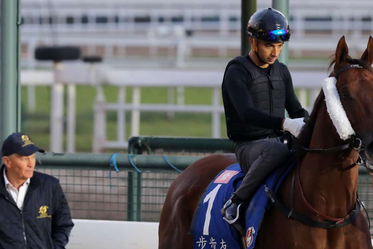 Joao Moreira takes Able Friend onto the track as John Moore gives final instructions. Photos: Kenneth Chan