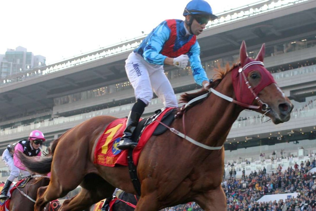 Joao Moreira pumps his first as Rapper Dragon wins the Hong Kong Classic Mile at Sha Tin on Sunday. Photos: Kenneth Chan