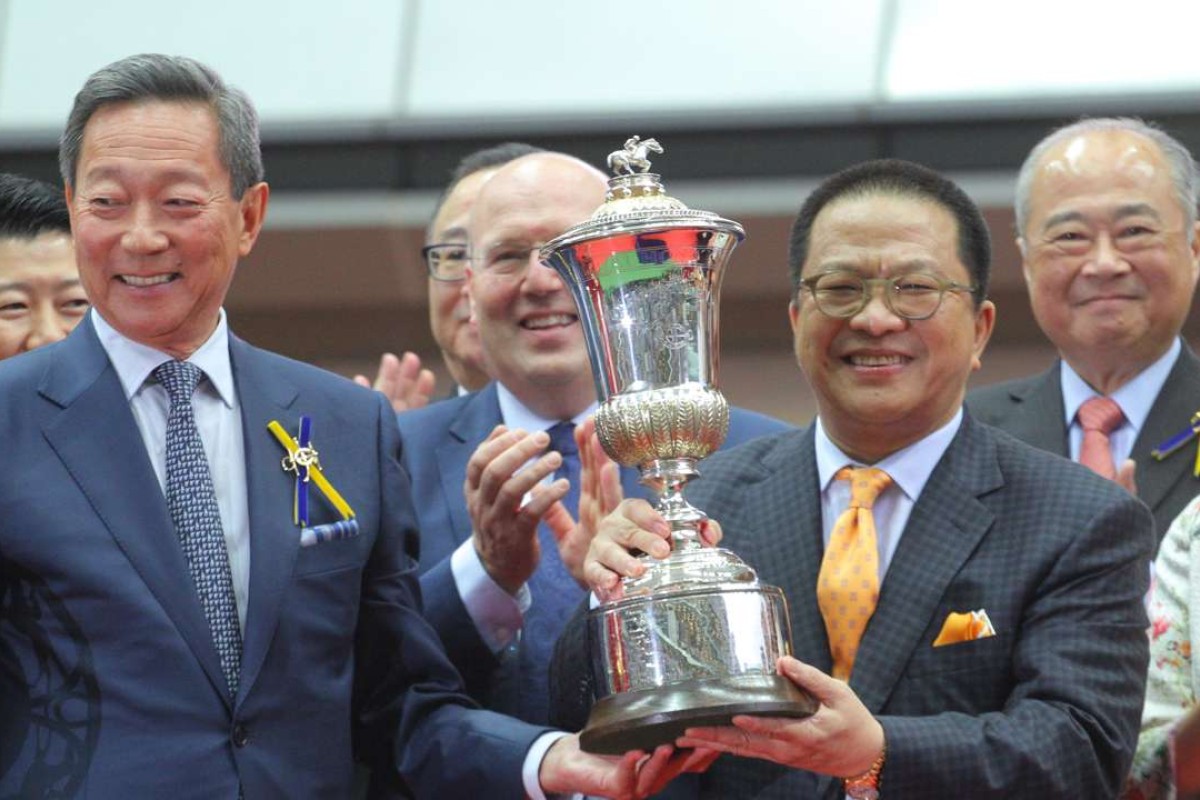 Jockey Club Chairman Simon Ip Sik-on (left) presents the Hong Kong Derby trophy to Werther’s owner Johnson Chen. Photos: Kenneth Chan