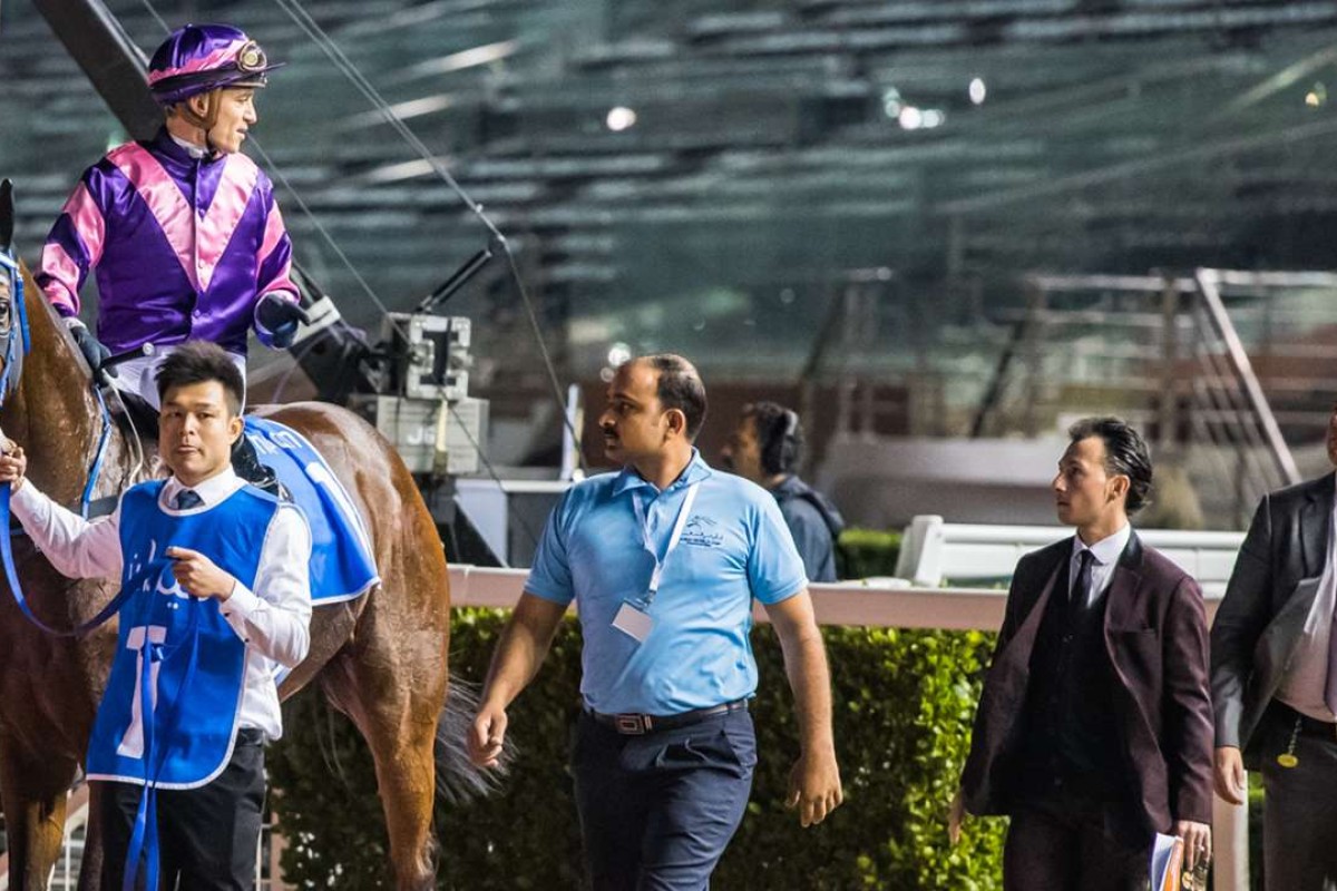 Trainer Caspar Fownes (right) is given the run down by Christophe Soumillon after Dundonnell finished second at Meydan last month. Photos: Donald Lee.