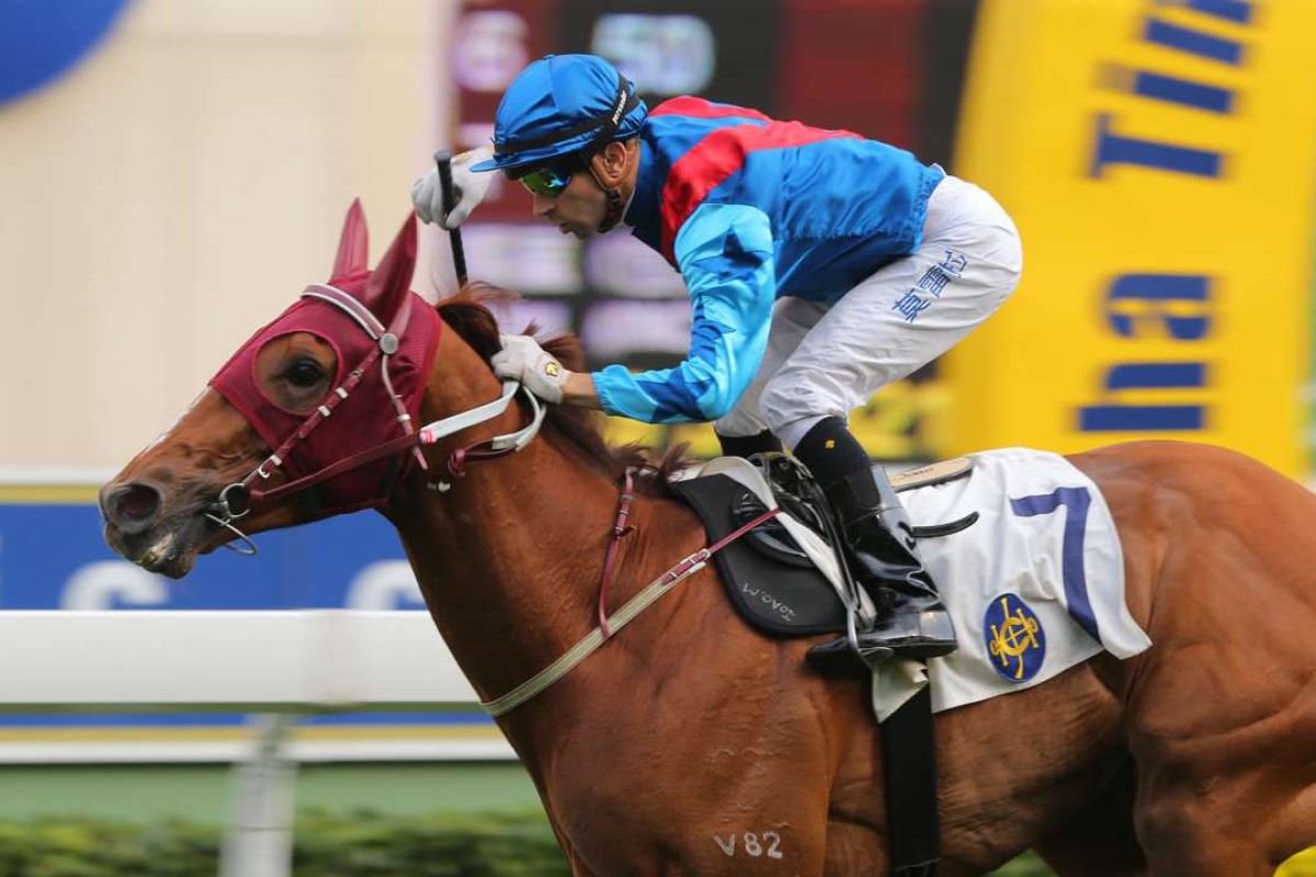 Joao Moreira punches the air after winning the Group Two Chairman’s Trophy with Rapper Dragon. Photos: Kenneth Chan