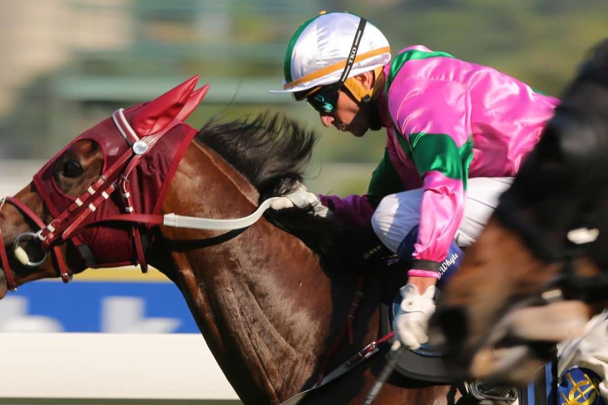 Douglas Whyte drives Magic Legend to victory at Sha Tin on Monday. Photos: Kenneth Chan