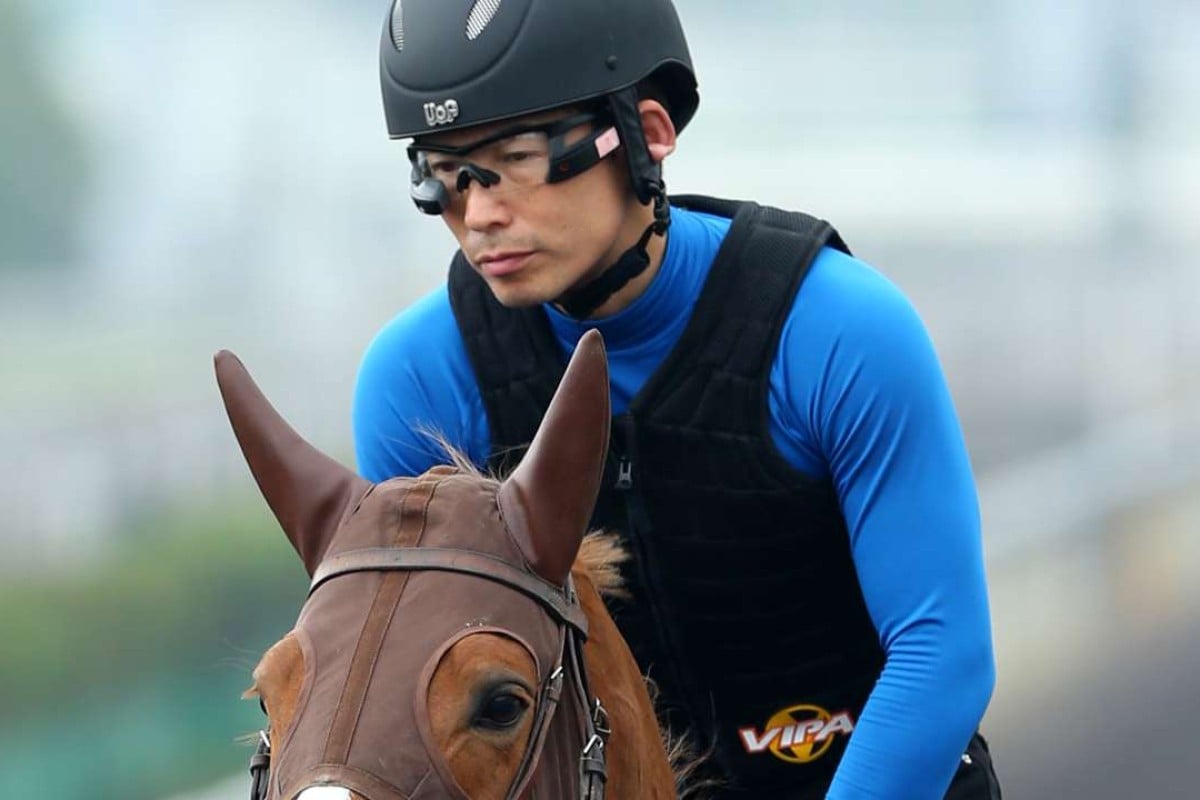 Work rider Shinjiro Kaneko wears his goggle technology giving him real-time information on Neorealism as he works at Sha Tin. Photos: Kenneth Chan