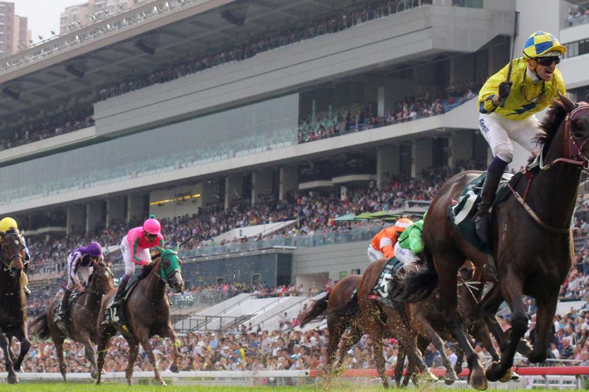 Hugh Bowman salutes as Werther wins the 2016 Audemars Piguet QE II Cup. Photos: Kenneth Chan