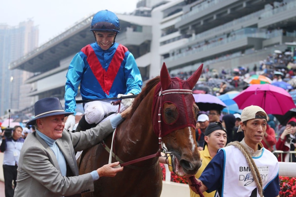 John Moore walks Rapper Dragon and Joao Moreira back after winning the BMW Hong Kong Derby. Photos: Kenneth Chan