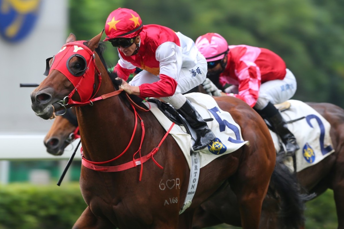 Zac Purton guides Chung Wah Spirit to victory at Sha Tin on Sunday, the Australian’s 700th winner in Hong Kong. Photos: Kenneth Chan